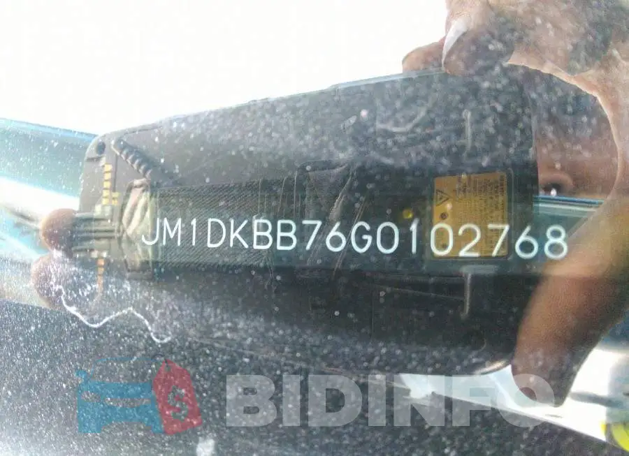 JM1DKBB76G0102768 Photo# 9