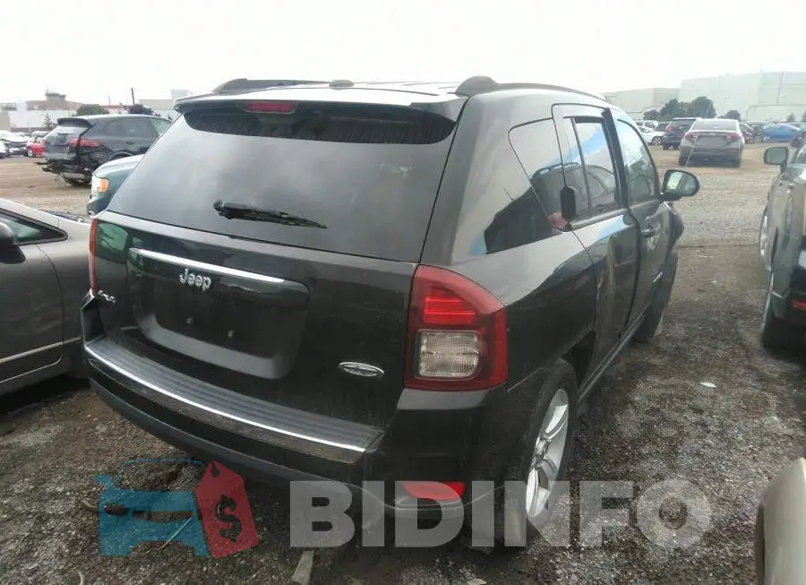 1C4NJDAB3GD722088 Photo# 4