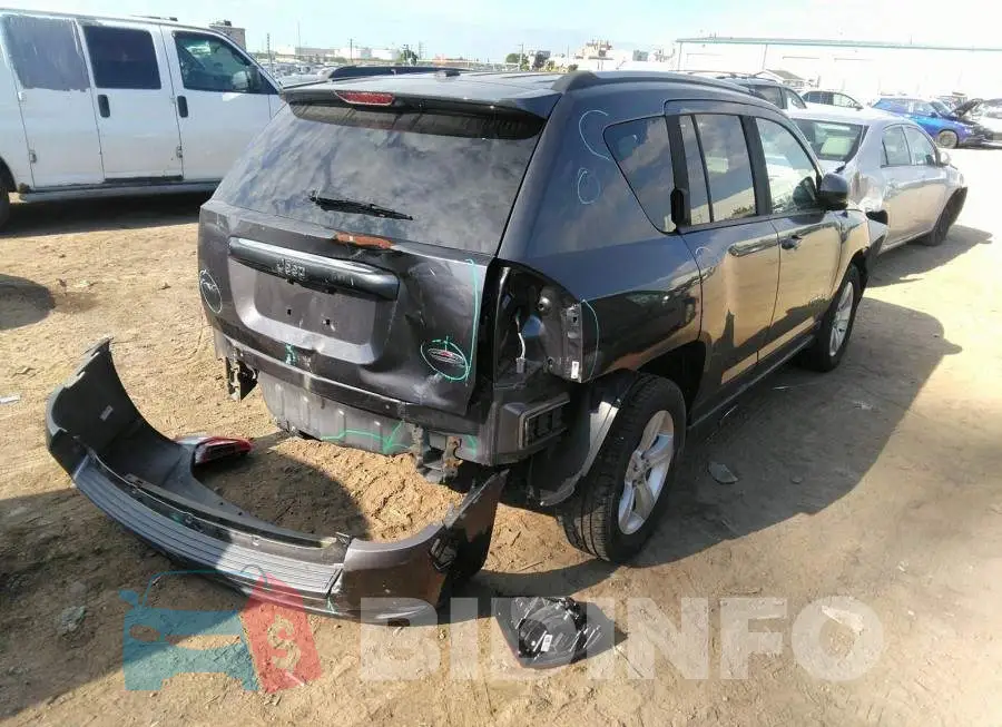 1C4NJDAB3GD593995 Photo# 4