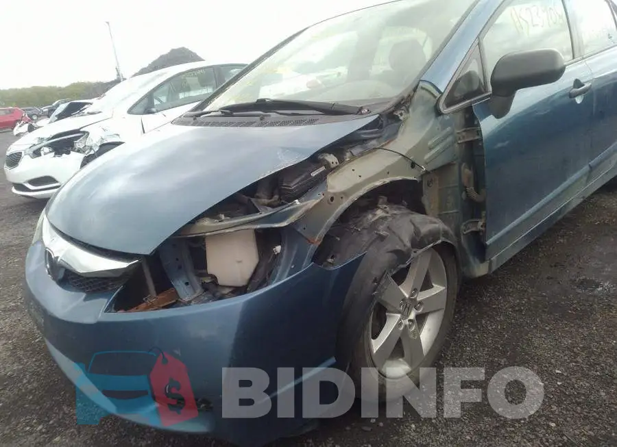 2HGFA1E24AH017115 Photo# 6