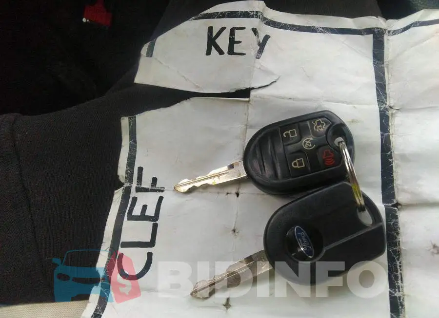 1FAHP2E8XEG104122 Photo# 11