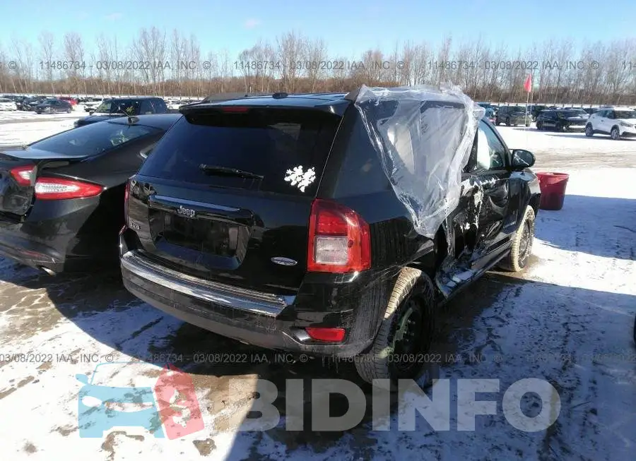 1C4NJDAB8GD626232 Photo# 4