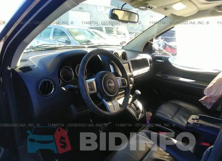 1C4NJDAB8GD626232 Photo# 5