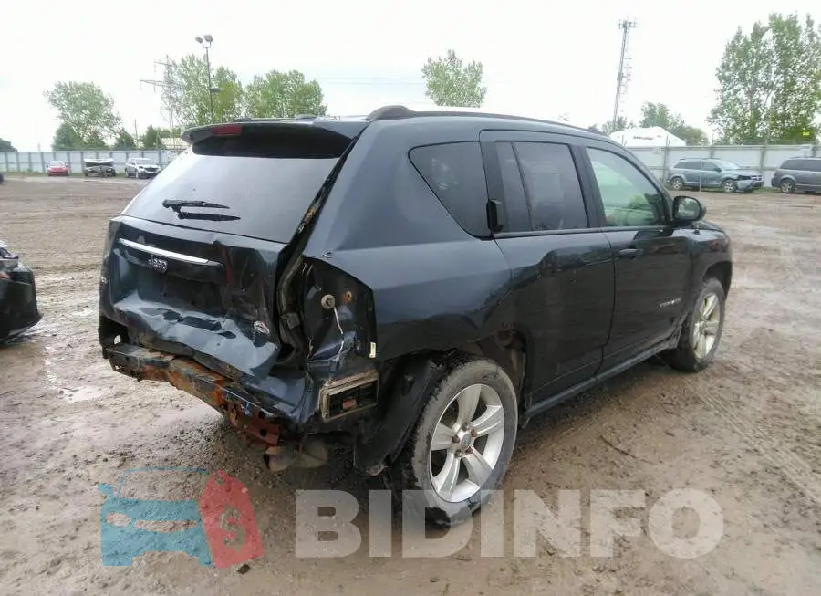 1C4NJDAB7ED530721 Photo# 4