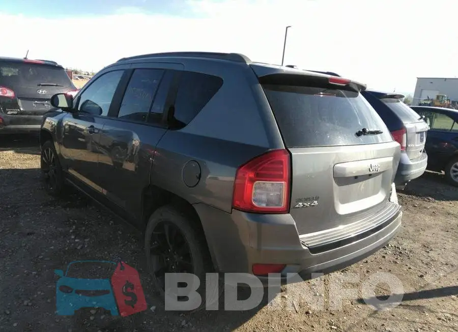 1C4NJDAB6CD671437 Photo# 3