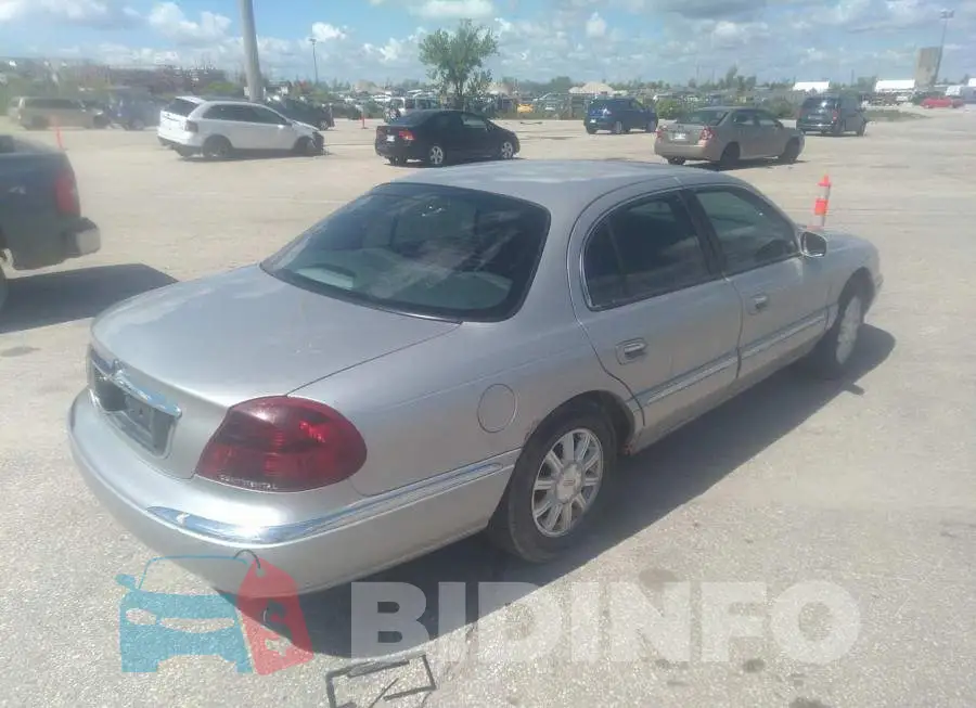 1LNHM97V02Y689308 Photo# 4