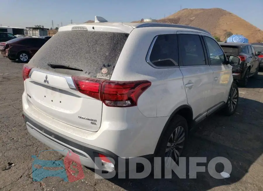 JA4AD3A31KZ024965 Photo# 4