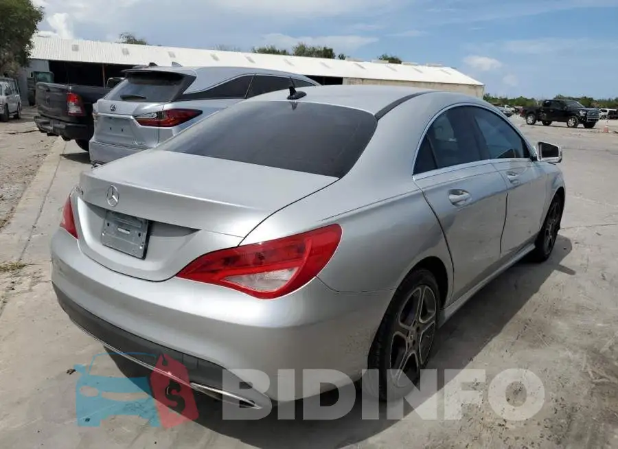 WDDSJ4EB9JN593049 Photo# 4