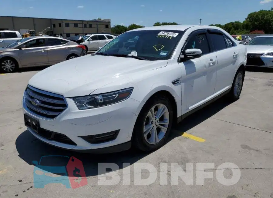 1FAHP2E8XGG142713 Photo# 2