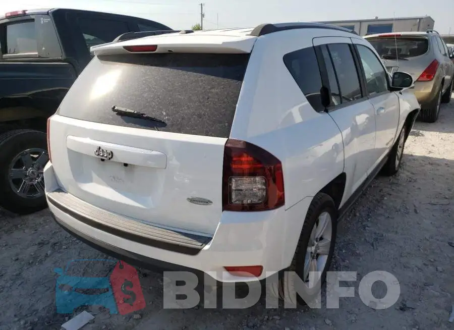 1C4NJCEAXGD628348 Photo# 4
