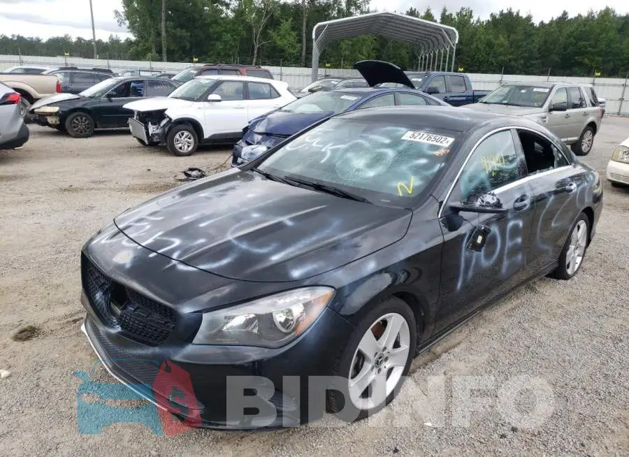WDDSJ4EB9JN576963 Photo# 2