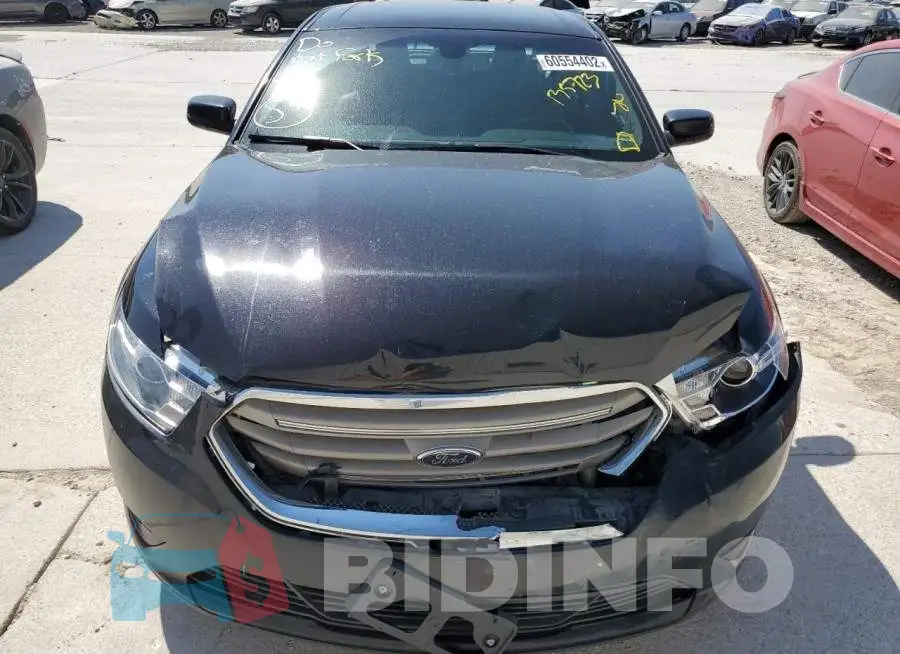 1FAHP2E81JG135723 Photo# 7