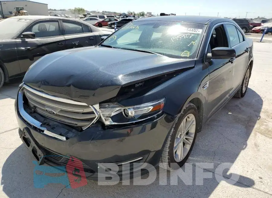 1FAHP2E81JG135723 Photo# 2