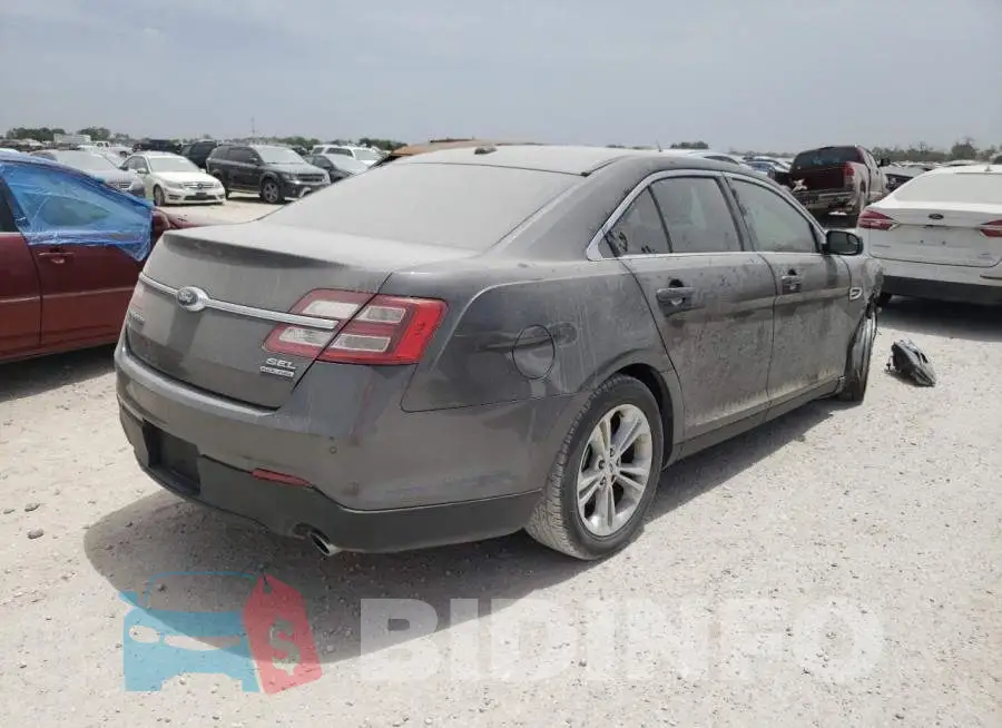 1FAHP2E85GG100725 Photo# 4