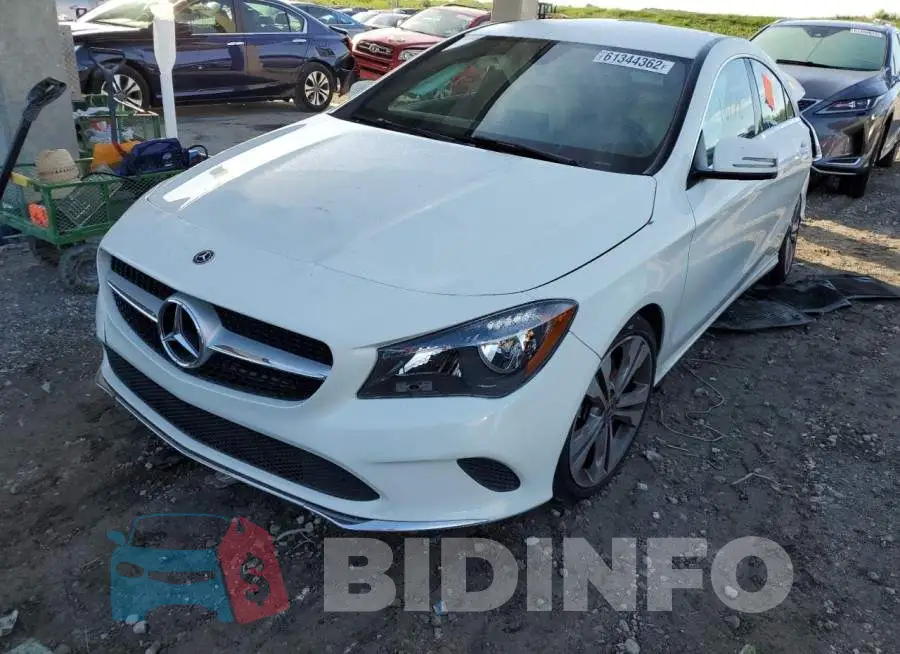 WDDSJ4EB6JN605867 Photo# 2