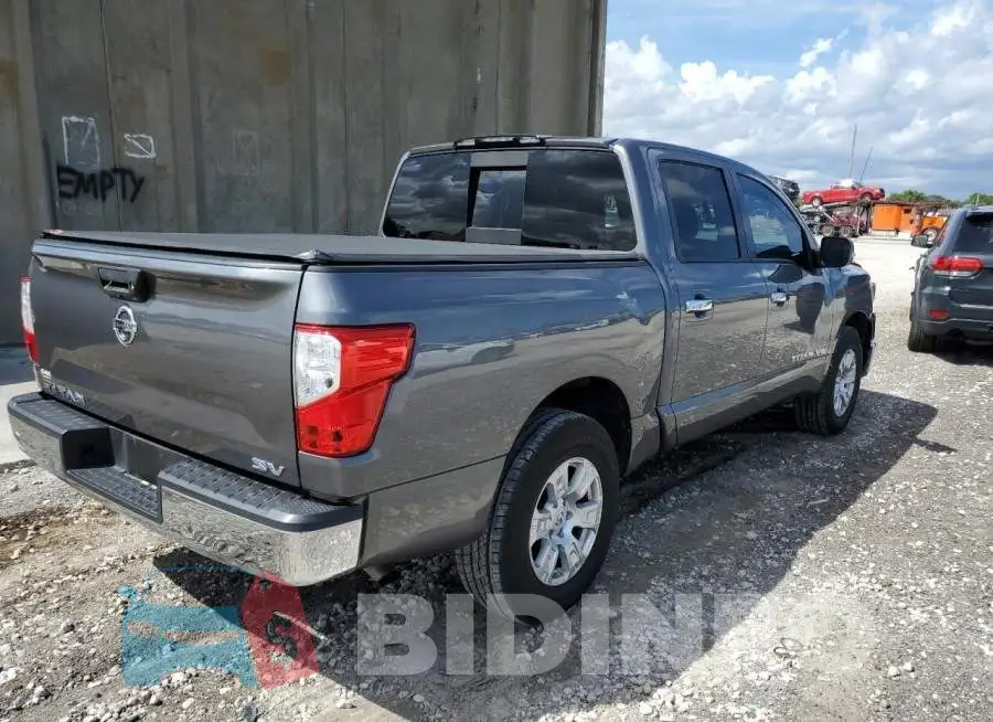 1N6AA1EK2JN502804 Photo# 4