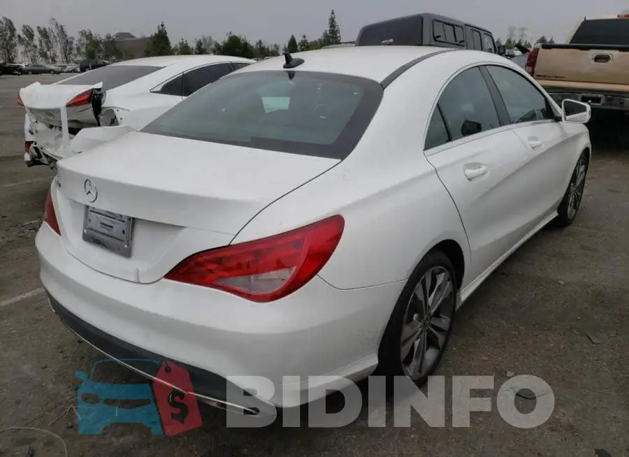 WDDSJ4EB6JN629764 Photo# 4