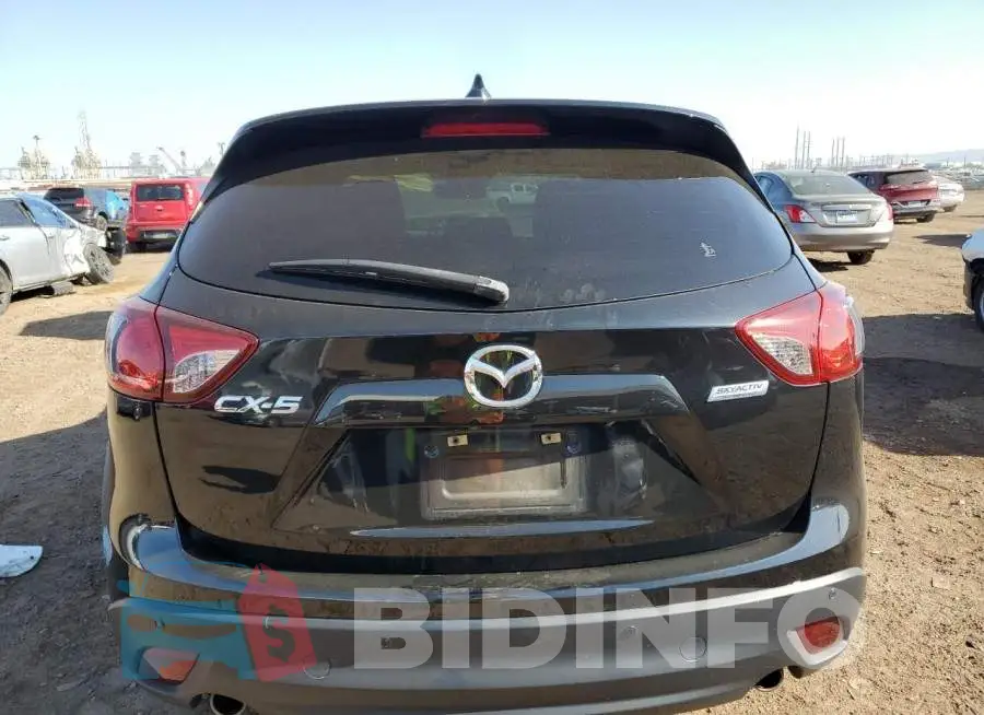 JM3KE2DY3F0553828 Photo# 6