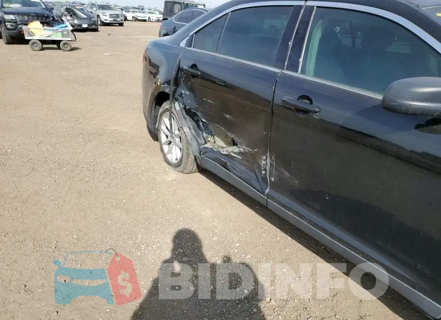 1FAHP2D89EG159890 Photo# 9