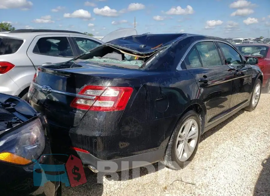 1FAHP2E87JG111202 Photo# 4