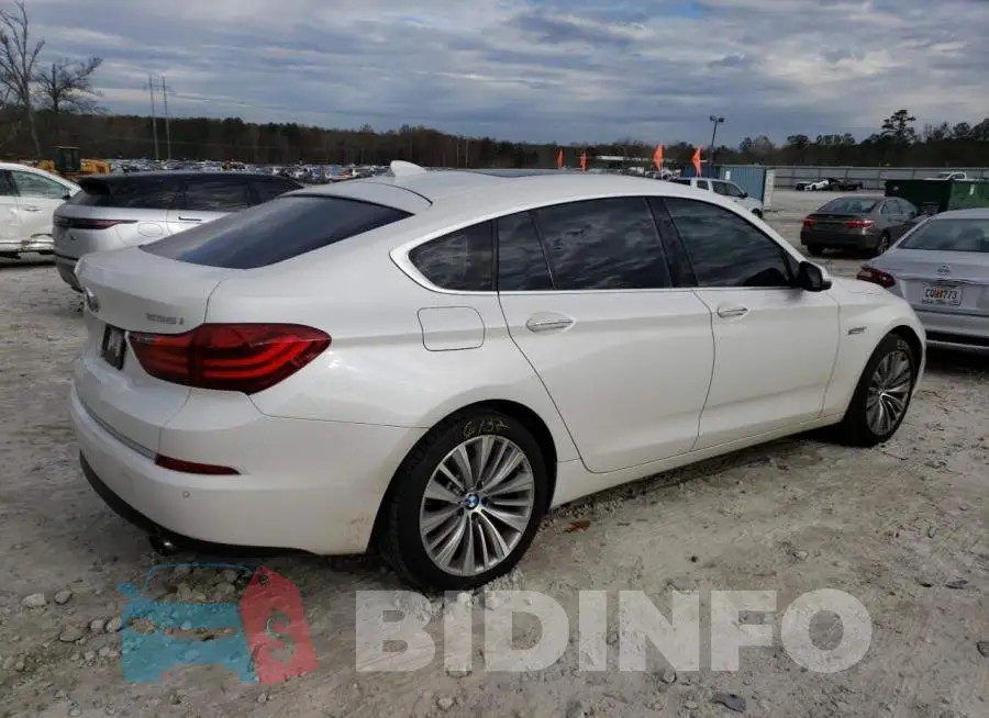 WBA5M2C57ED871827 Photo# 3