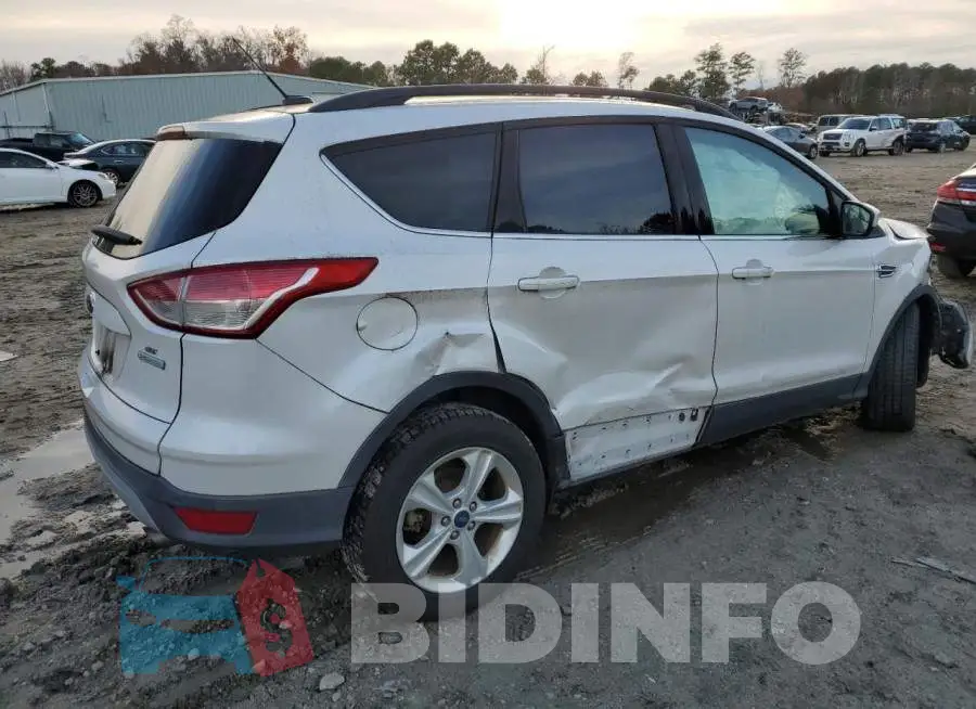 1FMCU0GX7GUA49084 Photo# 3