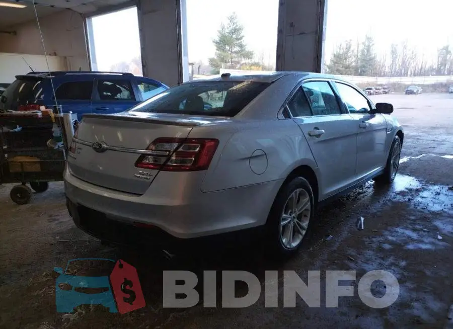 1FAHP2E85GG128525 Photo# 4