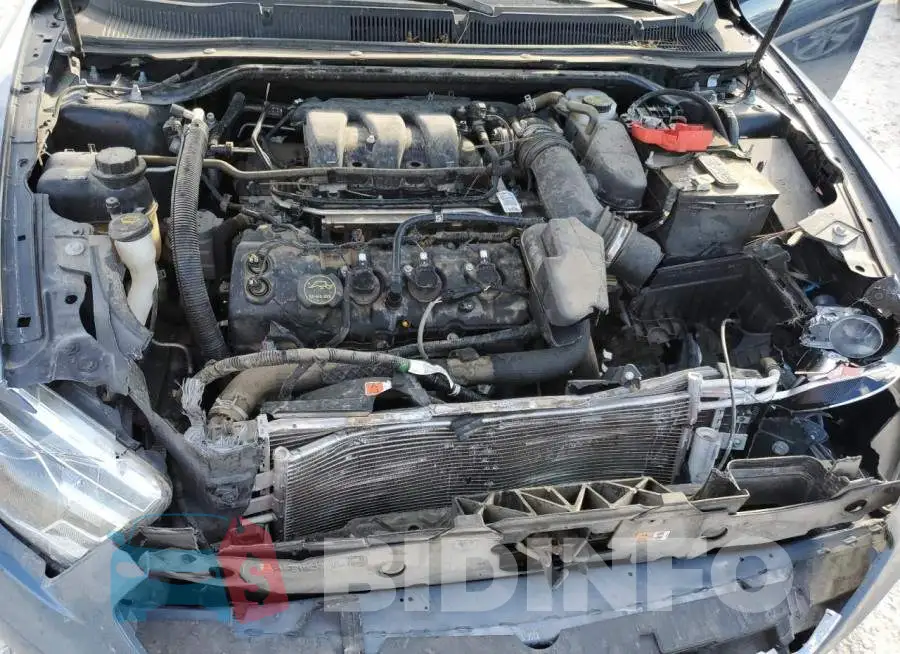 1FAHP2E88JG136626 Photo# 7