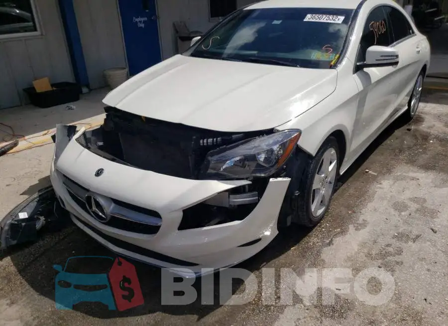 WDDSJ4EB2JN610273 Photo# 2