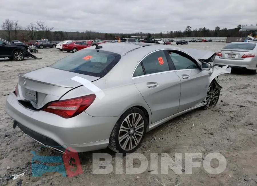 WDDSJ4EB6JN509141 Photo# 3
