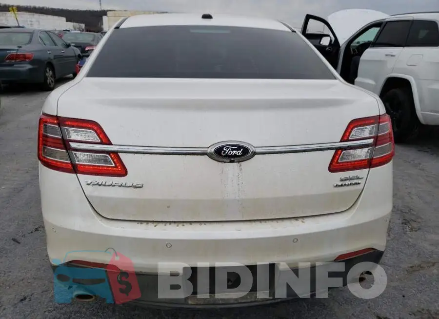 1FAHP2E85EG129249 Photo# 6