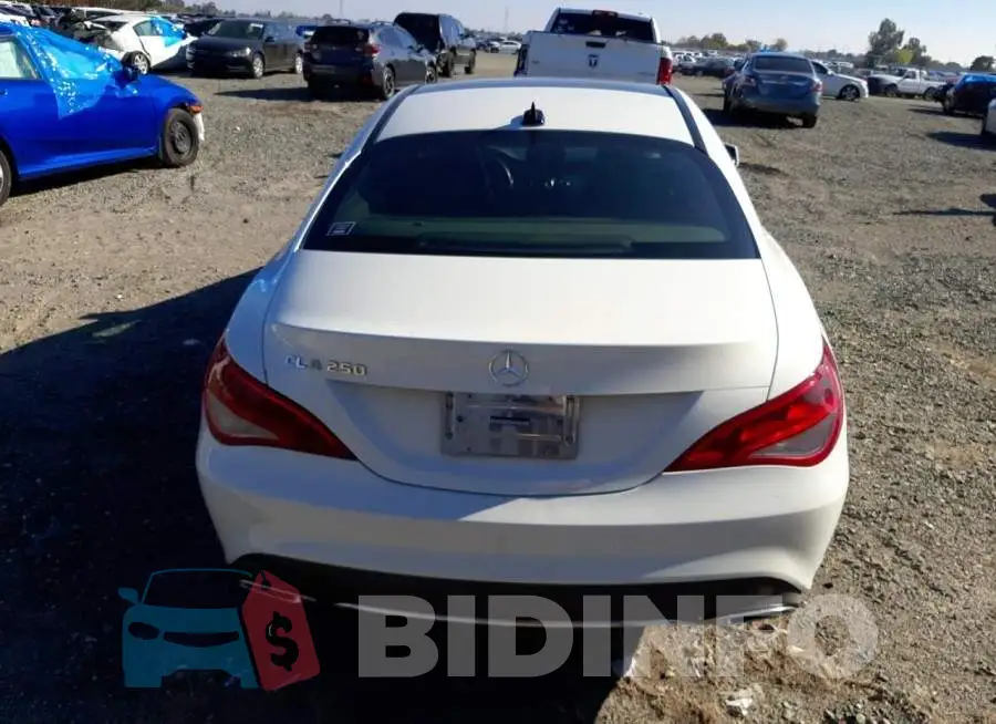 WDDSJ4EB9JN577787 Photo# 6