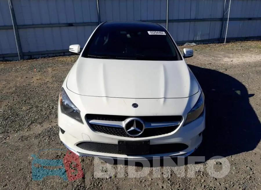 WDDSJ4EB9JN577787 Photo# 5