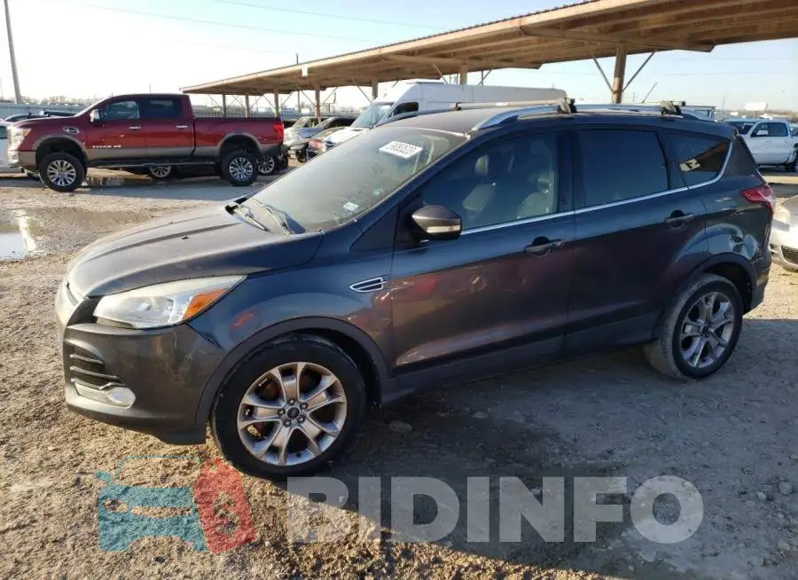 1FMCU0J90FUB48595 Photo# 1