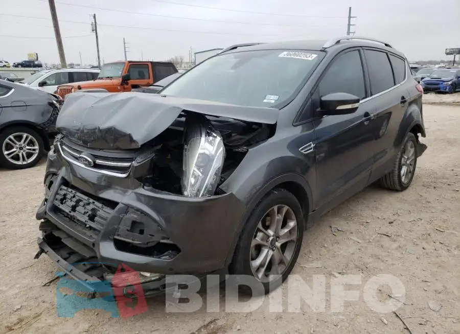 1FMCU0JX5FUB61115 Photo# 1