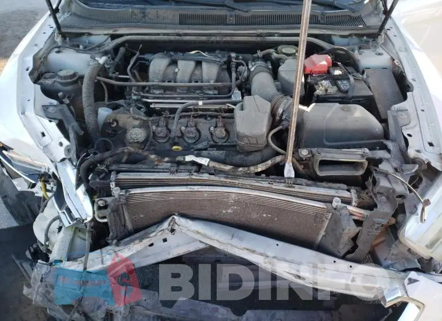 1FAHP2E83EG185013 Photo# 11
