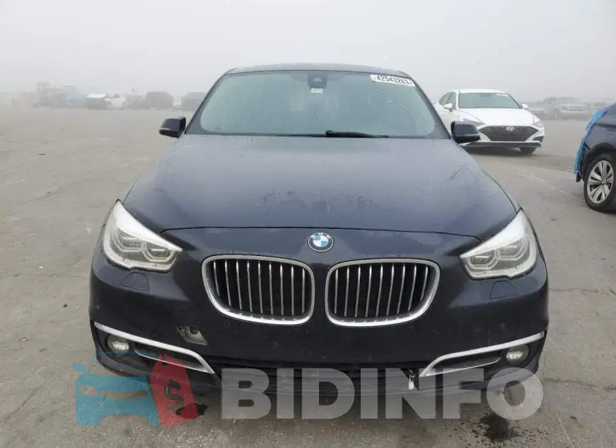 WBA5M4C52ED183925 Photo# 5