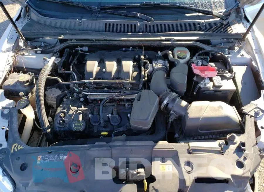 1FAHP2E8XFG165391 Photo# 11