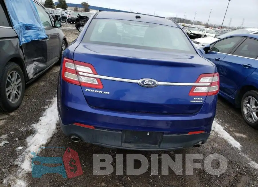 1FAHP2E85EG145001 Photo# 6