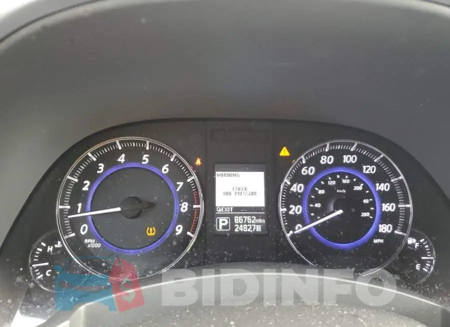 JN8CS1MU6FM381160 Photo# 9