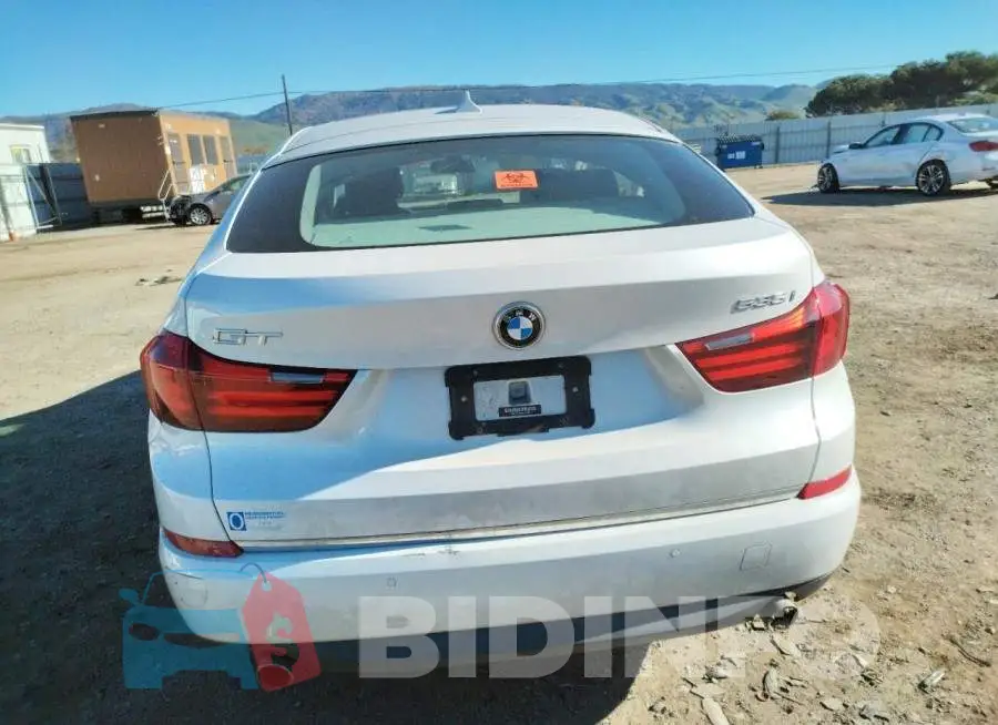 WBA5M2C56GGH99362 Photo# 6