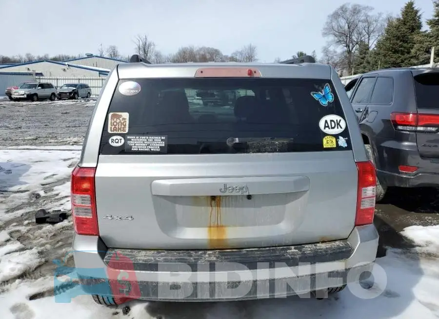 1C4NJRBB2ED841050 Photo# 6