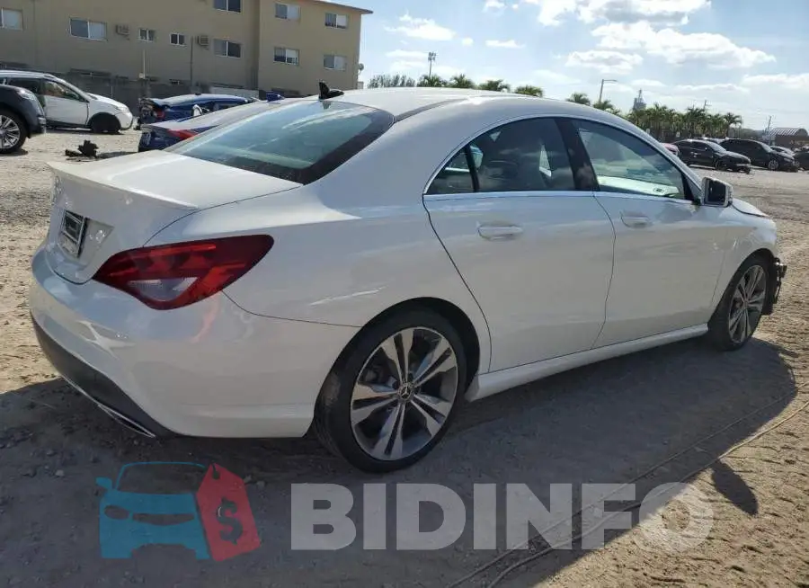 WDDSJ4EB1JN612077 Photo# 3