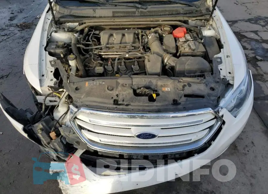 1FAHP2F8XFG103617 Photo# 11