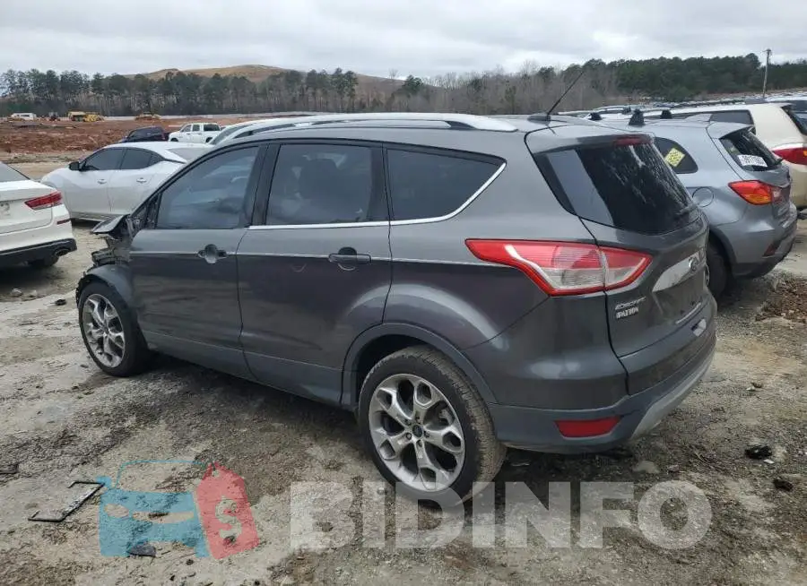 1FMCU0J93GUA42806 Photo# 2