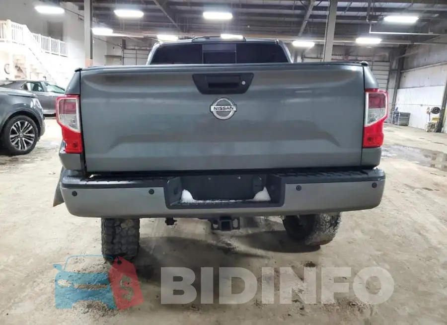 1N6AA1E54JN509697 Photo# 6