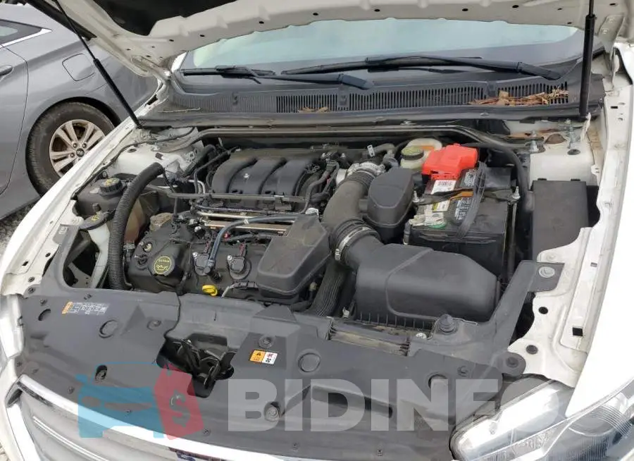 1FAHP2E80GG125662 Photo# 11