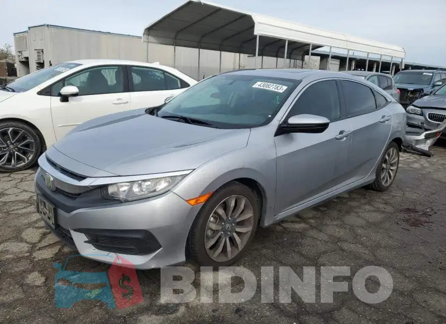 19XFC2F74JE203127 Photo# 1