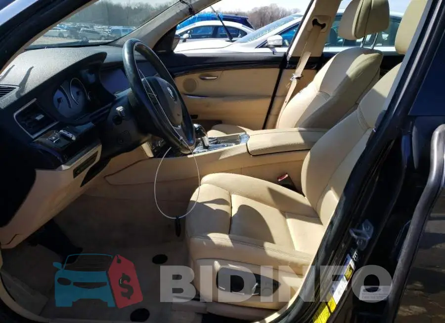 WBA5M2C53ED871825 Photo# 7