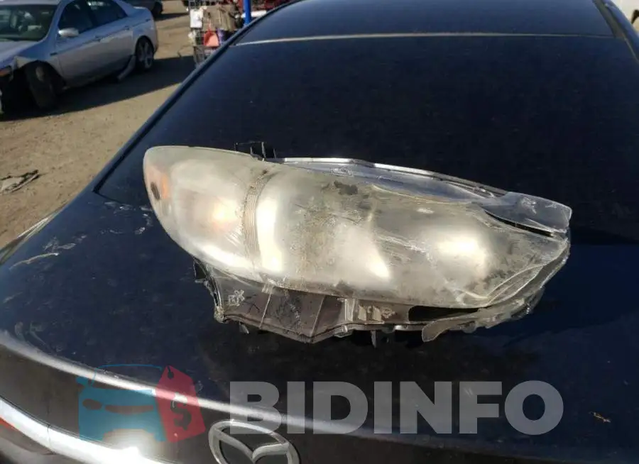 JM1GJ1V6XE1124776 Photo# 12